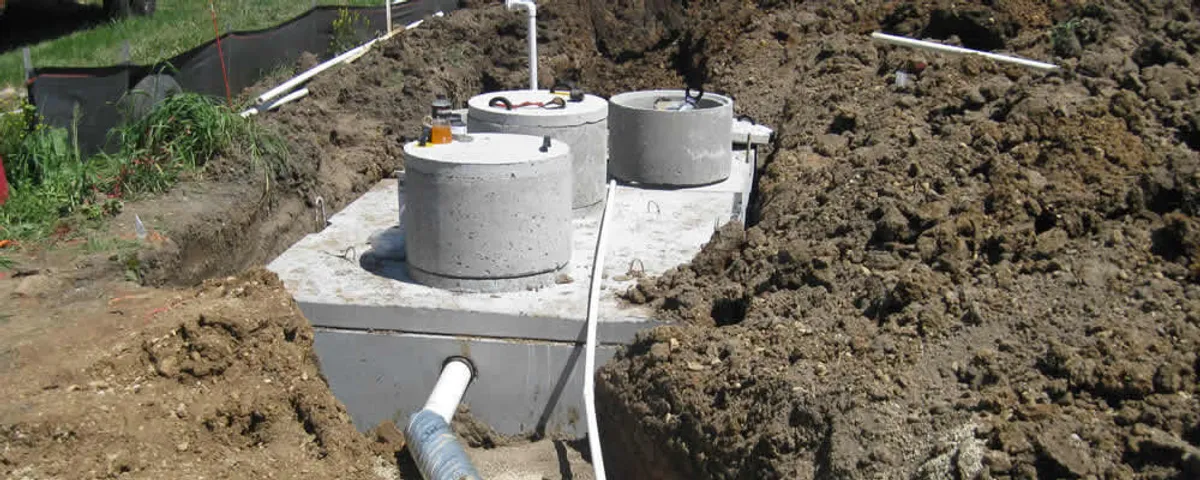 Septic system repair and installation site with tank access ports in Orlando, FL